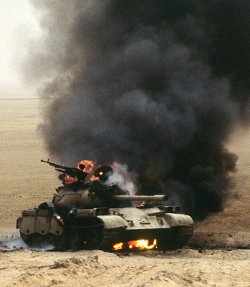 A hit battle tank in flames.